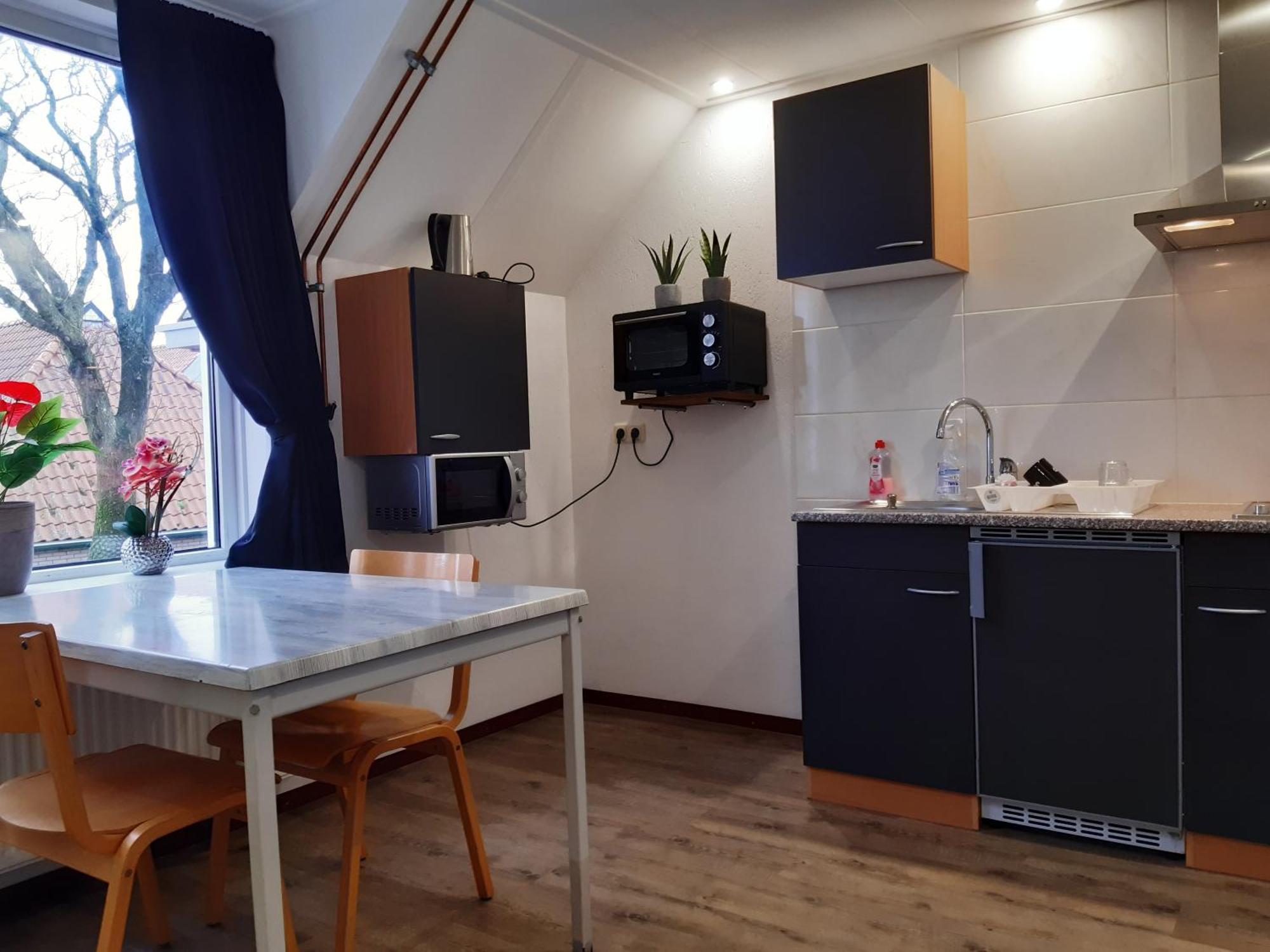 Pension Het Hoefijzer Buren  Extérieur photo